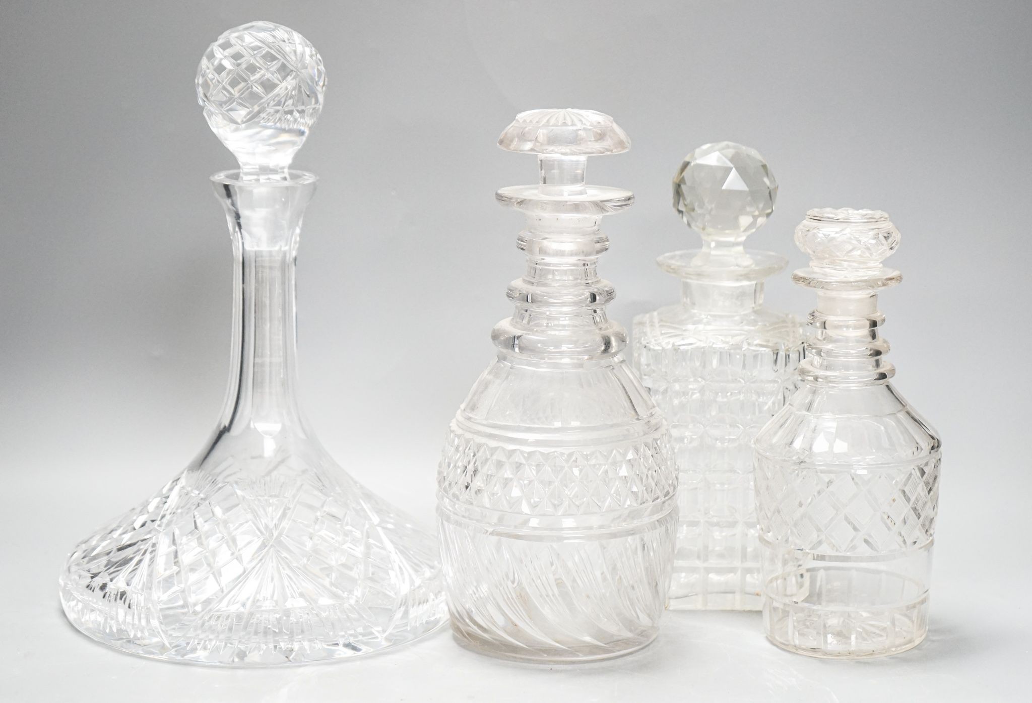 Fourteen various glass decanters 33cm